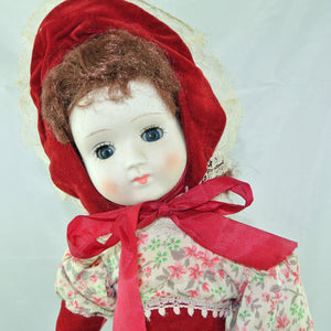 Mädchen mit Rot weißem Blumenkleid / Porzellankopf & Stoffkörper / ca. 45 cm