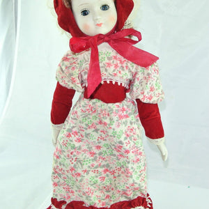 Mädchen mit Rot weißem Blumenkleid / Porzellankopf & Stoffkörper / ca. 45 cm