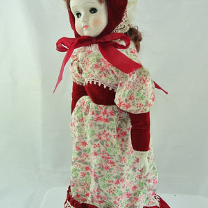 Mädchen mit Rot weißem Blumenkleid / Porzellankopf & Stoffkörper / ca. 45 cm