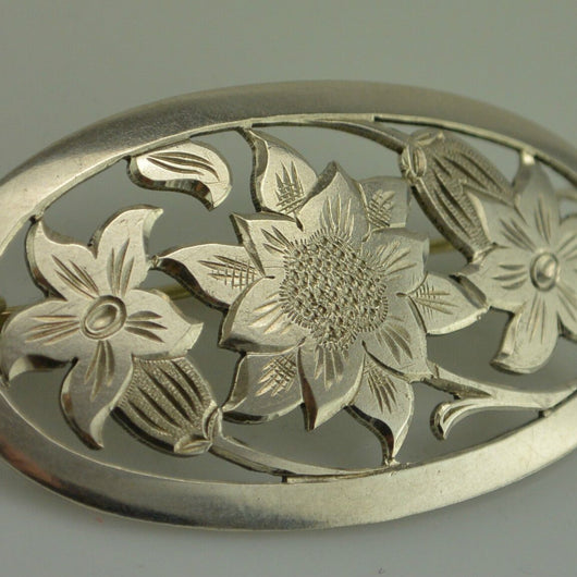 Brosche mit Blumenmotiv / 835er Silber