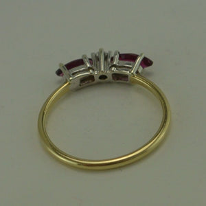 Ring - Gelbgold 333er 8 Karat - mit „Diamant" & 2 Rubine 50 15,9 mm Ø